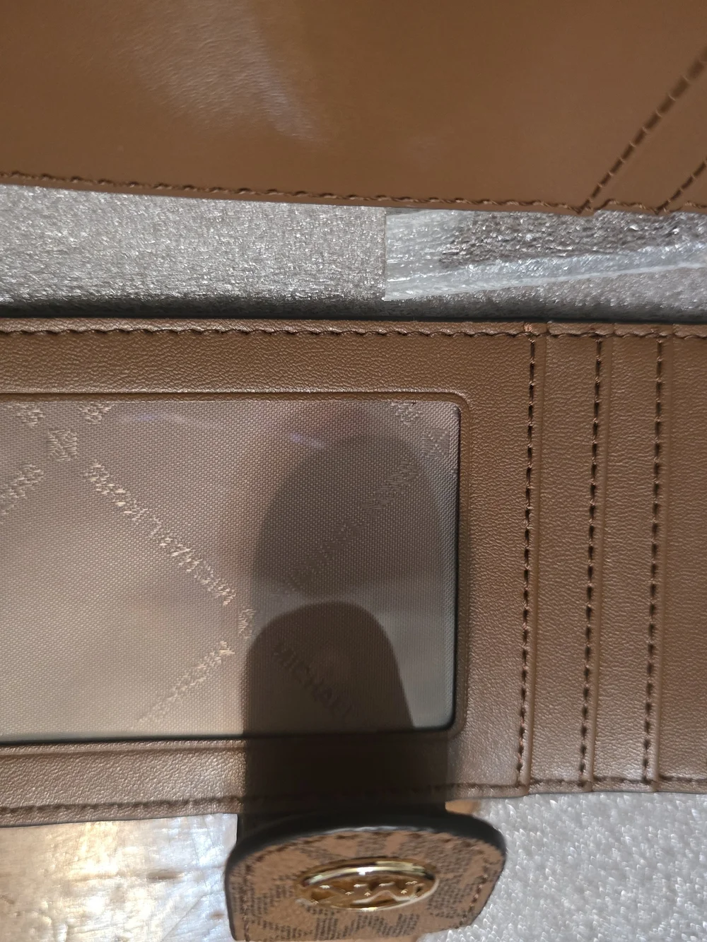Michael Kors Brown Pebbled Leather Continental Wallet with Signature Trim